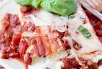 Three-Cheese Manicotti with Italian Sausage Marinara