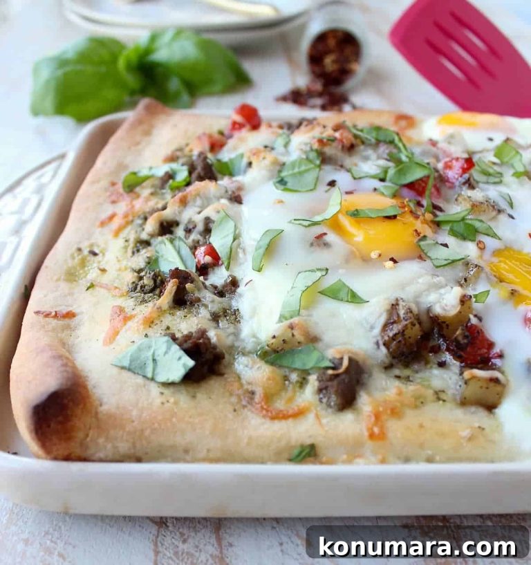 Sheet-Pan Breakfast Pizza Recipe with Eggs and Bacon 3 Sheet-Pan Breakfast Pizza Recipe with Eggs and Bacon