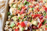 Loaded Cauliflower Nachos with Cheese and Jalapeños