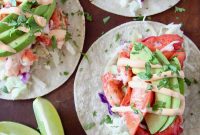 Lobster Tacos with Avocado and Cilantro-Lime Slaw