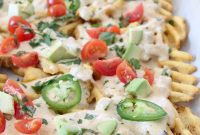Loaded Waffle Fry Nachos with Green Chile Cheese Sauce
