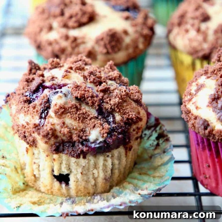 Decadent Blueberry Cream Cheese Muffins with Chocolate Crumble