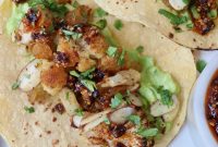 Crispy Roasted Cauliflower Tacos with Lime Slaw
