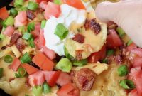 Loaded Irish Nachos with Cheddar, Bacon and Green Onion