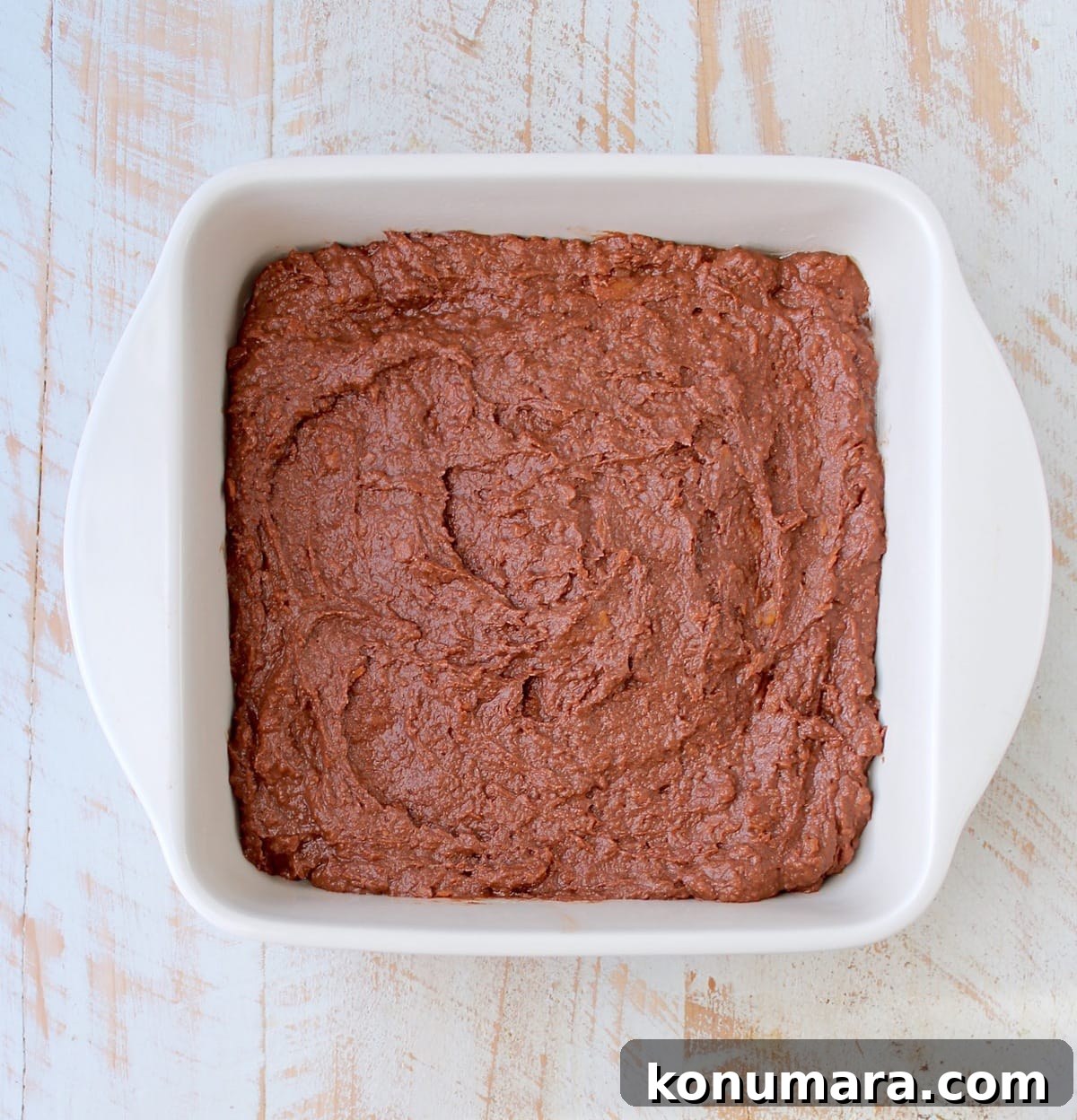 Gluten Free Sweet Potato Brownies are a rich and creamy treat, perfect for fall, topped with vanilla bean ice cream and drizzled with caramel syrup!