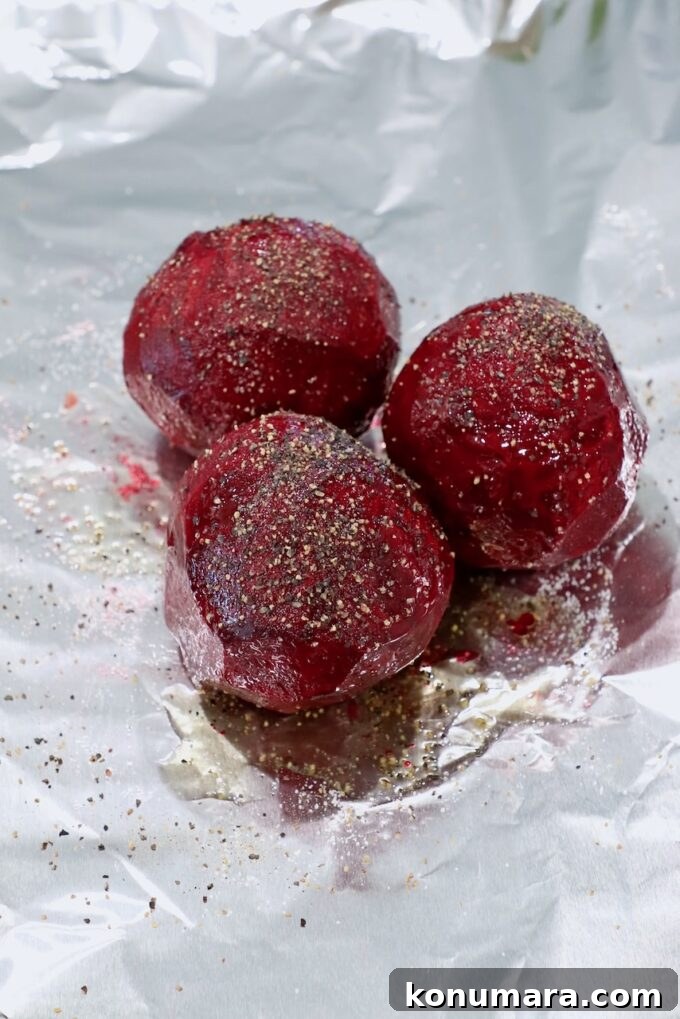 seasoned raw peeled beets on foil