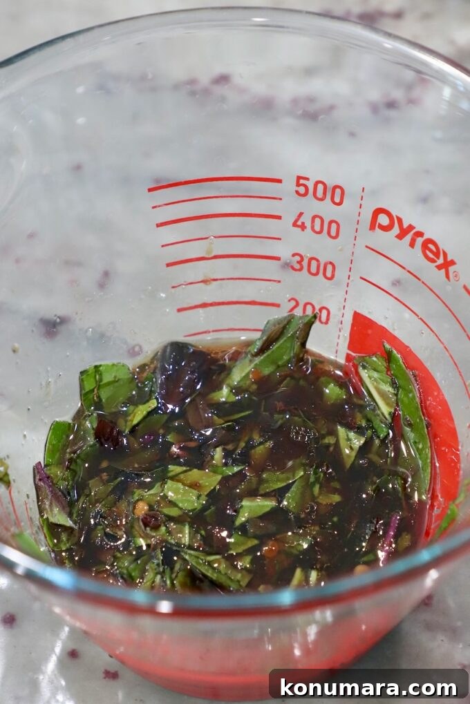 Authentic Thai Drunken Noodles (Pad Kee Mao) Recipe 4 sauce for drunken noodles in glass measuring bowl