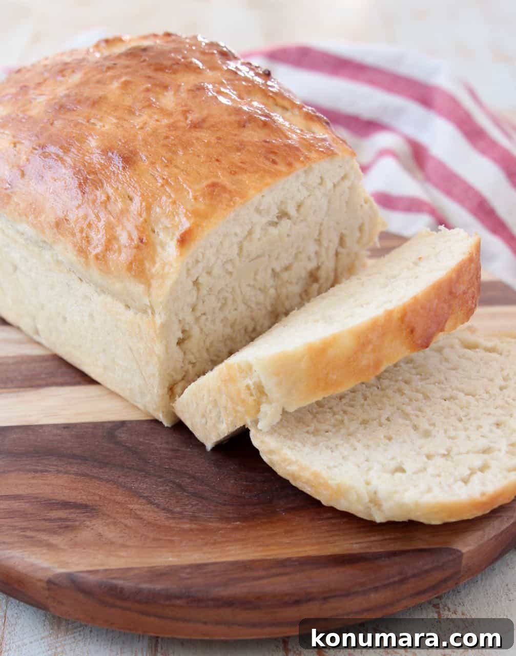 Fluffy Homemade Potato Bread Recipe 2 Sliced loaf of potato bread on cutting board