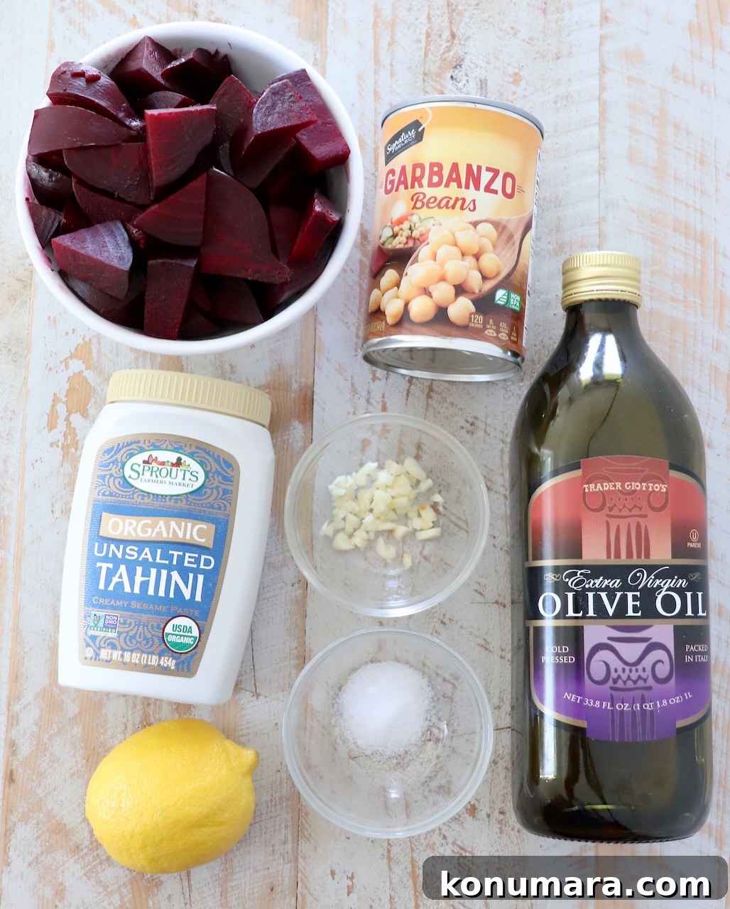 Creamy Roasted Beet Hummus with Lemon and Garlic 5 ingredients for beet hummus on white wood board