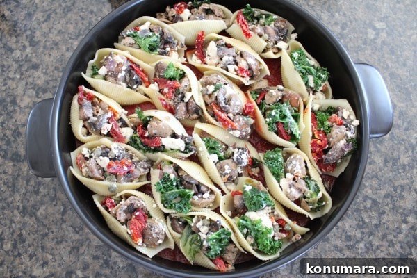 Mediterranean Sausage-Stuffed Shells Recipe 9 Mediterranean Stuffed Shells in a pot.