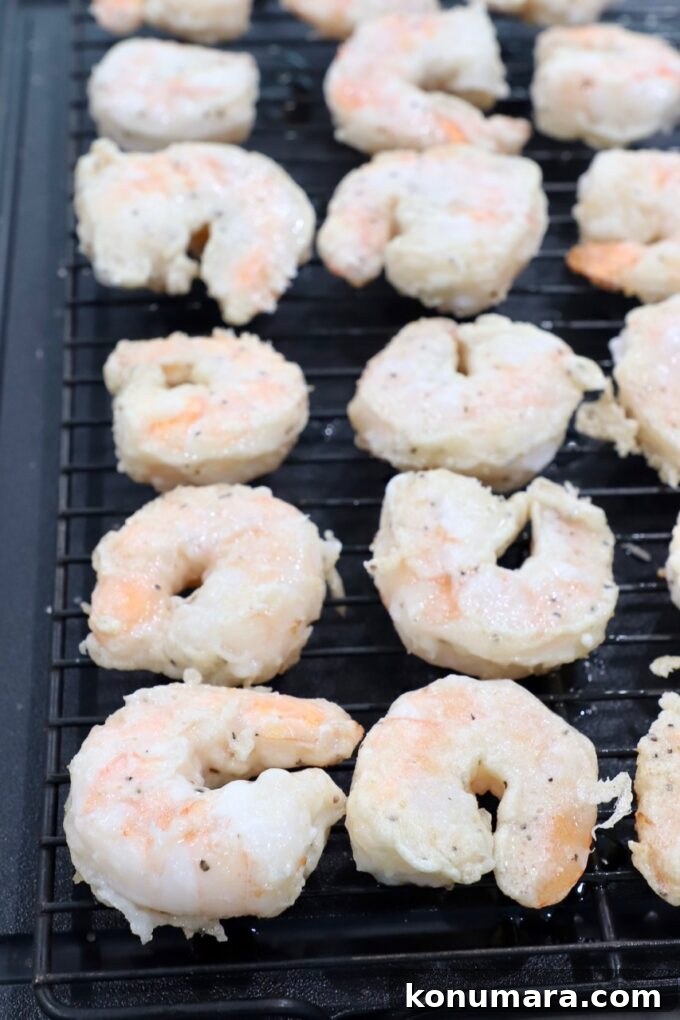 Crispy Honey Walnut Shrimp with Candied Walnuts 8 battered cooked shrimp on wire rack