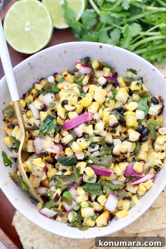 corn salsa in bowl with spoon