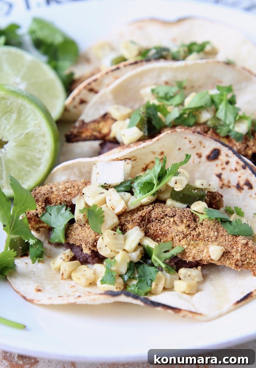 Crispy baked avocado tacos with corn salsa on plate