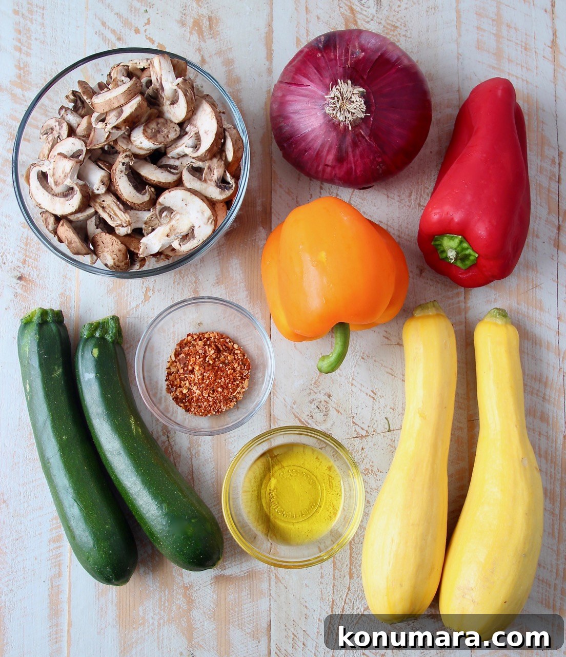 Grilled Vegetable Skewers Recipe with Garlic Herb Marinade 5 ingredients for grilled vegetable skewers on a white wood board