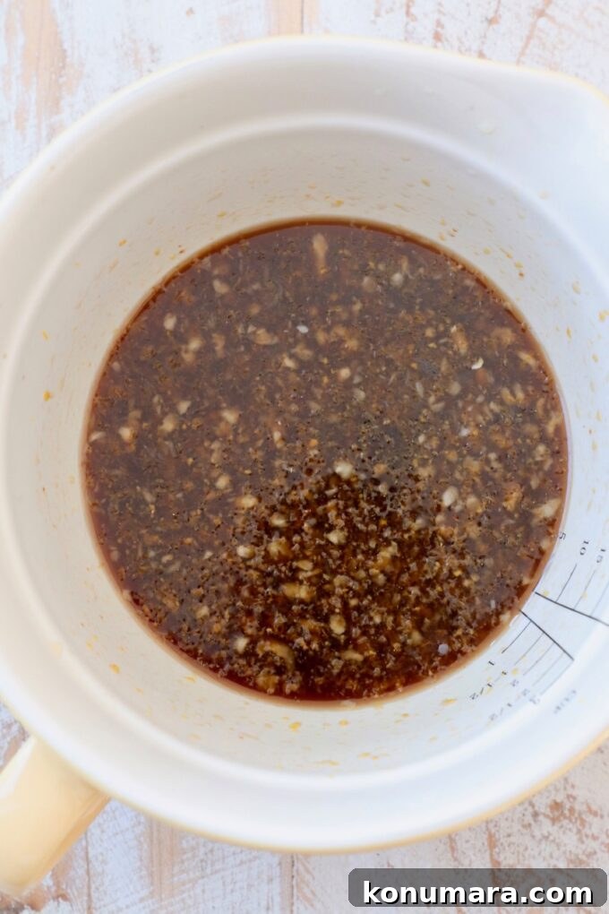 orange sauce in mixing bowl