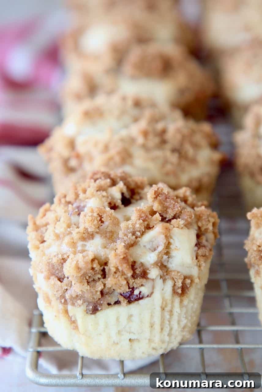 Bacon maple muffins with brown sugar crumble, sitting on wire rack