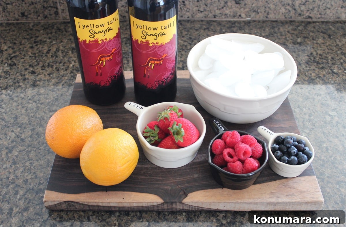 Frozen Sangria Ingredients on a wood board on a kitchen coutertop