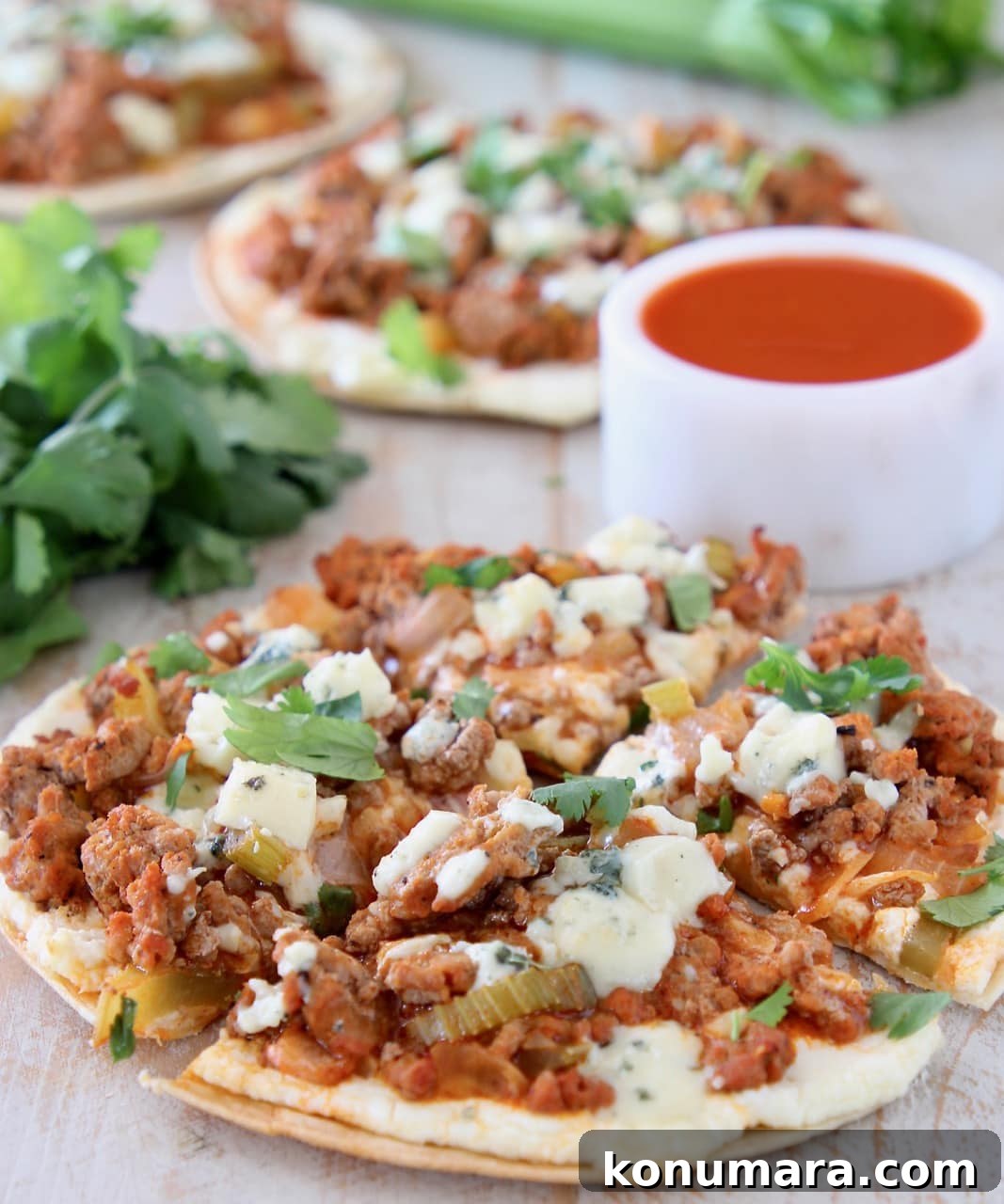 Buffalo Turkey Grilled Flatbread with Melted Cheese 3 Buffalo ground turkey on flatbread topped with blue cheese crumbles