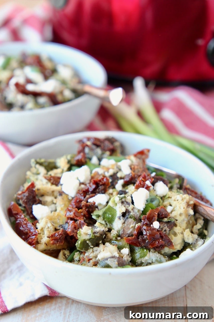 Slow-Cooker Greek Breakfast Casserole with Feta and Spinach 3 Greek eggs in bowls with sun dried tomatoes and green onions