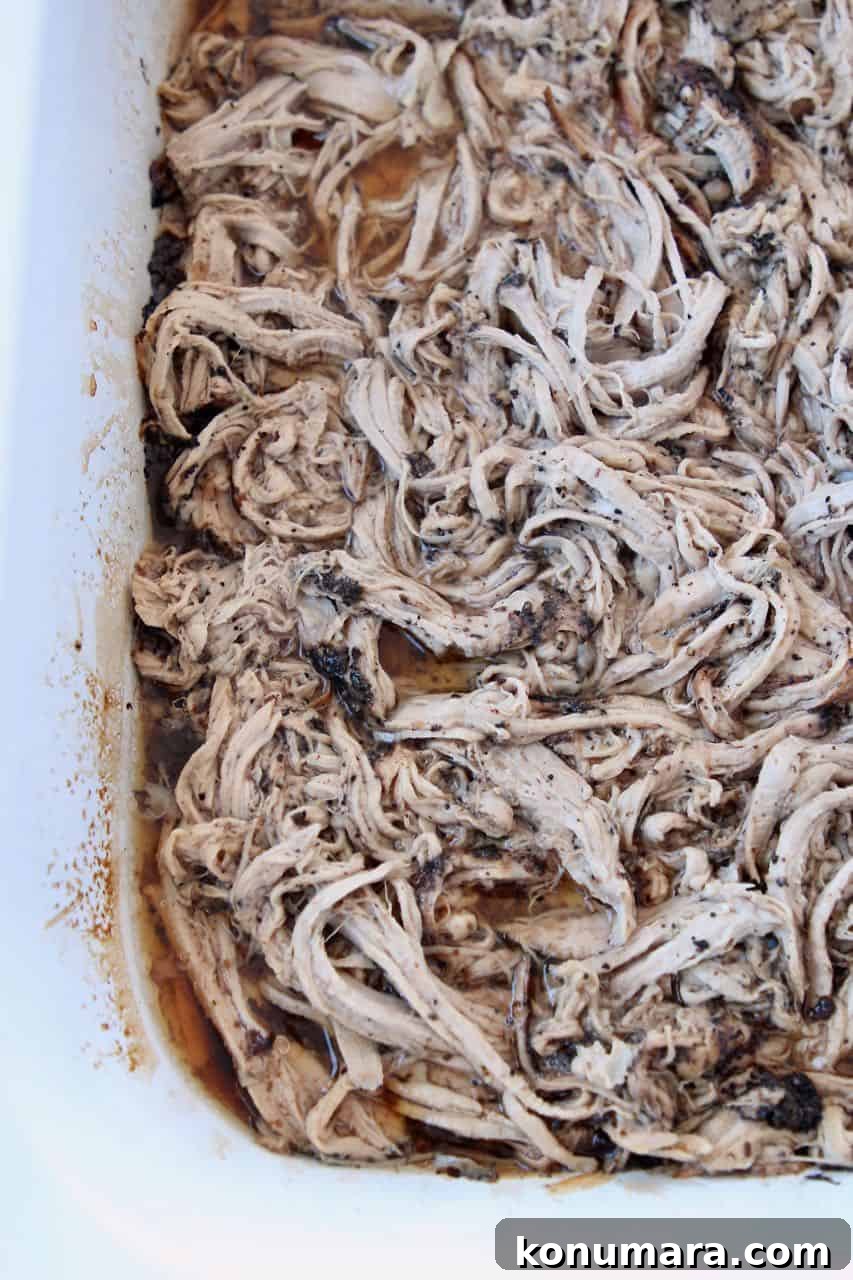 Slow Cooker Coffee-Crusted Pulled Pork Tenderloin Recipe 3 Crock pot filled with coffee crushed pulled pork tenderloin