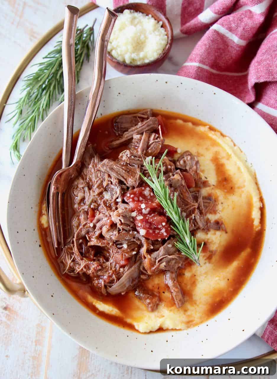 Slow Cooker Beef Ragu Recipe for Pasta 2 Slow cooker shredded beef ragu in bowl with creamy polenta