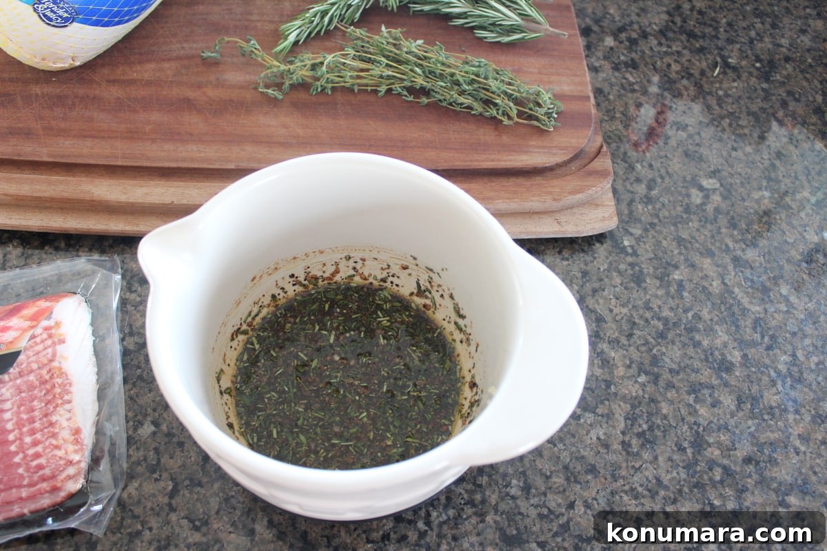 Crispy Bacon-Wrapped Turkey Breast Recipe 4 balsamic vinegar, olive oil and herbs in a bowl