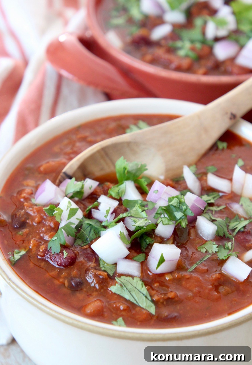 Hearty Slow Cooker Vegan Chili Recipe 5 vegan chili in bowl with spoon