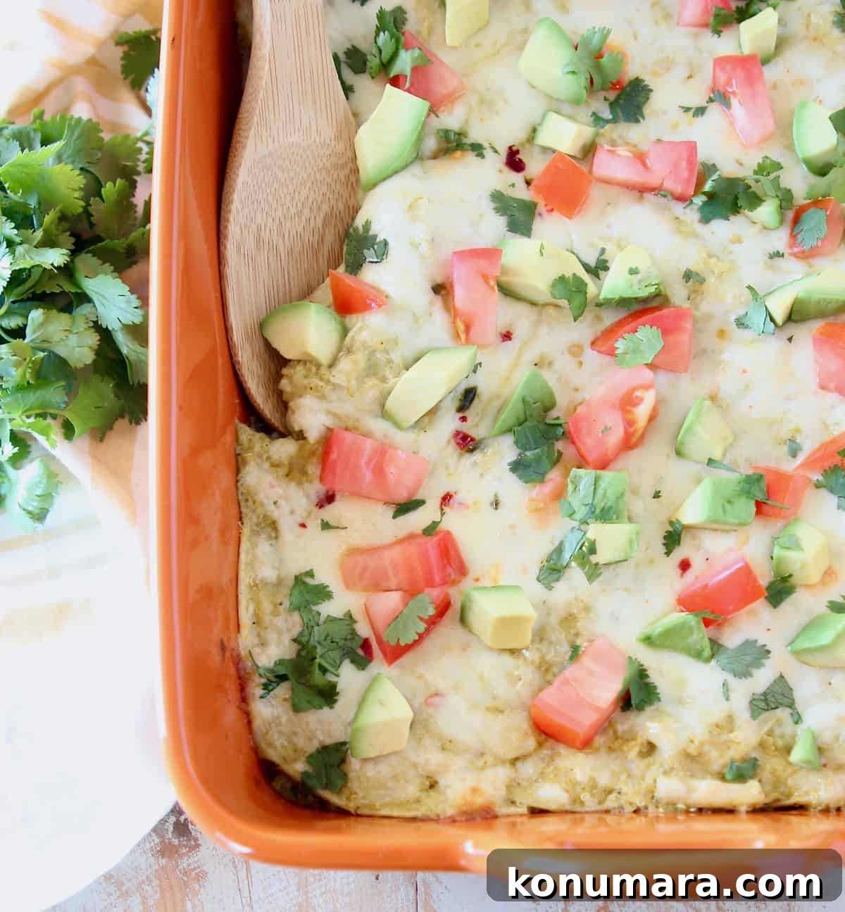 Baked Chicken Enchilada Casserole Recipe 5 Chicken enchilada casserole topped with diced tomatoes and avocado