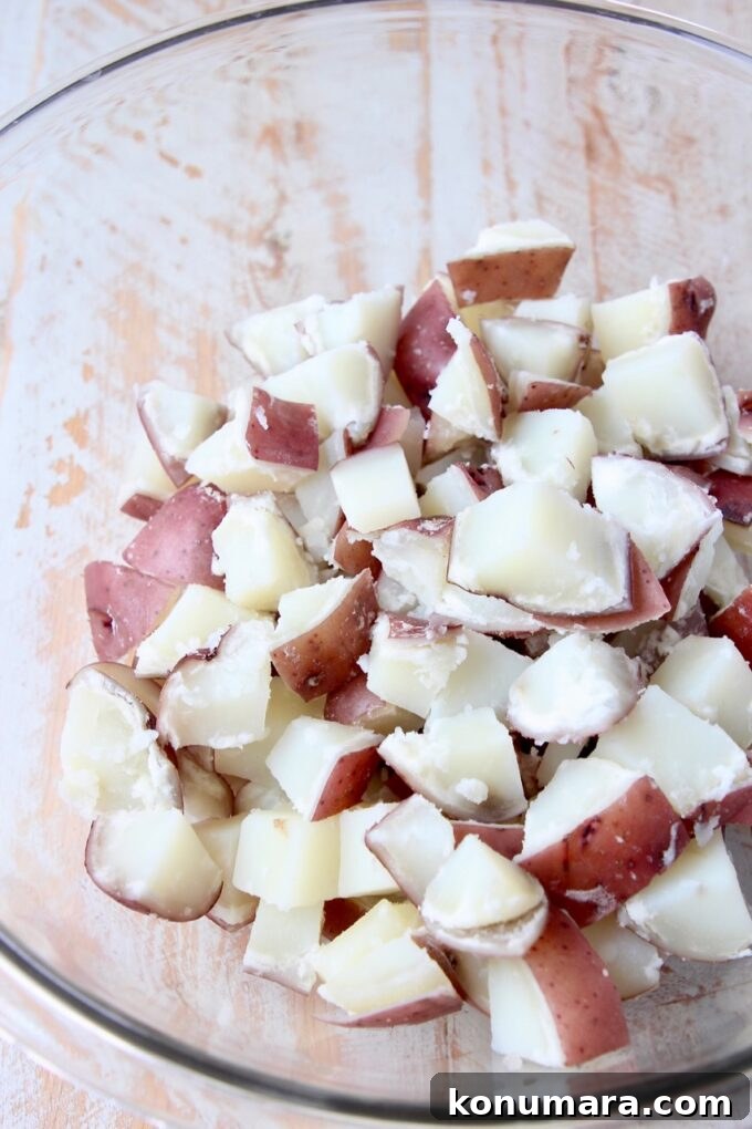 Buffalo Potato Salad with Blue Cheese and Celery 4 boiled, cubed red potatoes in a large glass bowl