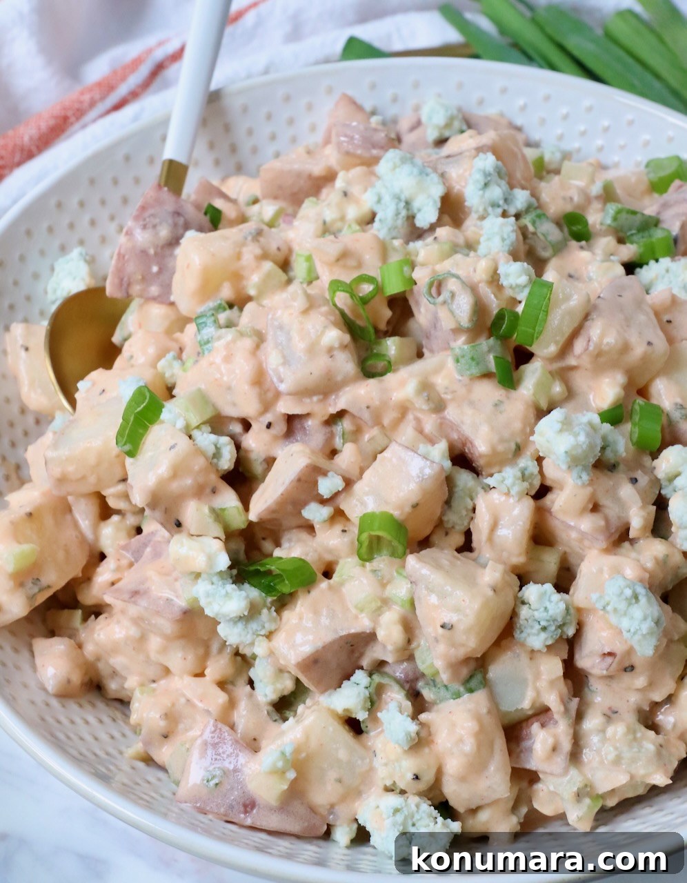 Buffalo Potato Salad with Blue Cheese and Celery 6 potato salad in bowl with spoon