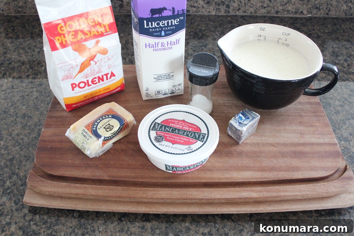 Ingredients for cheesy polenta on a wood board