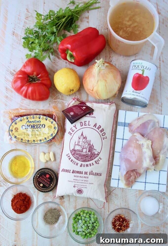 Authentic Spanish Chorizo and Chicken Paella Recipe 3 overhead image of ingredients for chicken paella