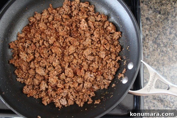 cooked ground beef in a skillet