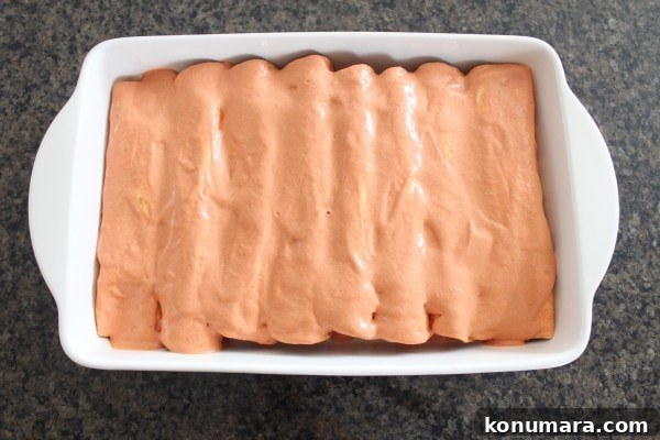 enchiladas in a creamy sriracha sauce in a baking dish