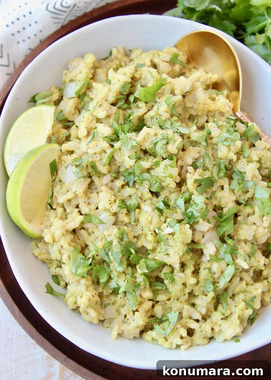 Creamy Cilantro Pesto Risotto Recipe 2 Pesto risotto in bowl with lime wedges on the side