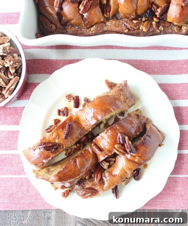 Salted Caramel Praline French Toast Recipe 11 Slices of Salted Caramel Praline French Toast on a white plate.