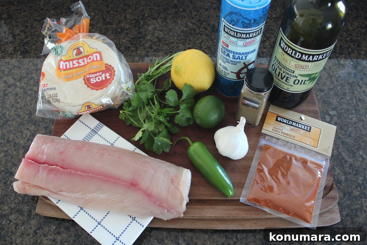 Grilled Mahi-Mahi Tacos with Avocado Lime Slaw 3 Mahi Mahi Fish Tacos Ingredients on a wood board