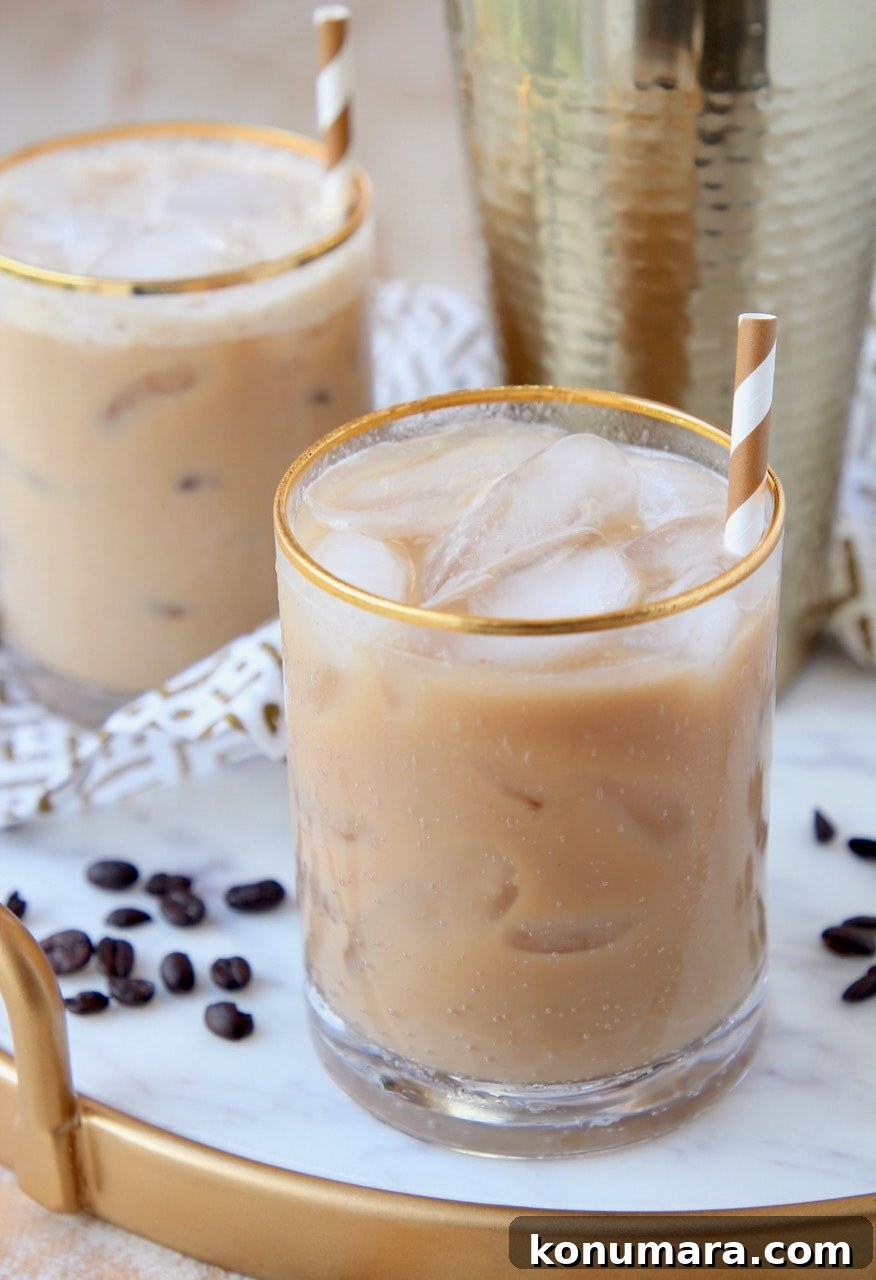 Long Island Drink with coffee in glasses on marble serving tray