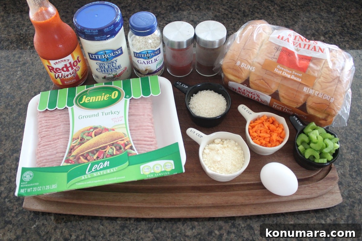 Buffalo Turkey Meatball Sub Ingredients on a wood board