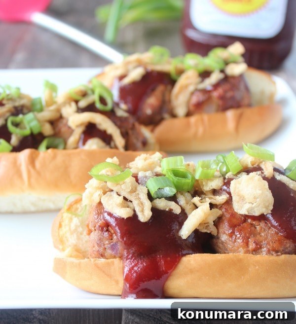 Smoky BBQ Meatball Sub with Melted Cheese 7 BBQ Meatball Subs with Crispy Onions