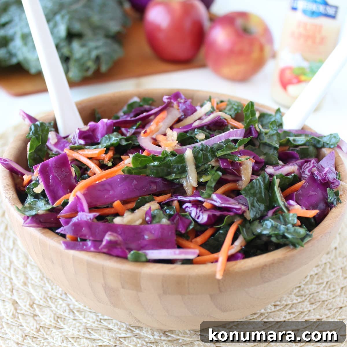 Kale and Apple Slaw Recipe with Lemon Vinaigrette 2 Kale Apple Slaw in a wood bowl