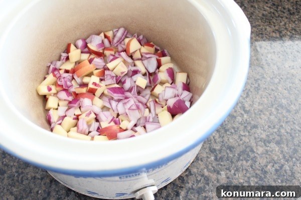 Slow-Cooked BBQ Brisket Sandwich with Smoky Sauce 4 diced onions and apples in a Crock Pot