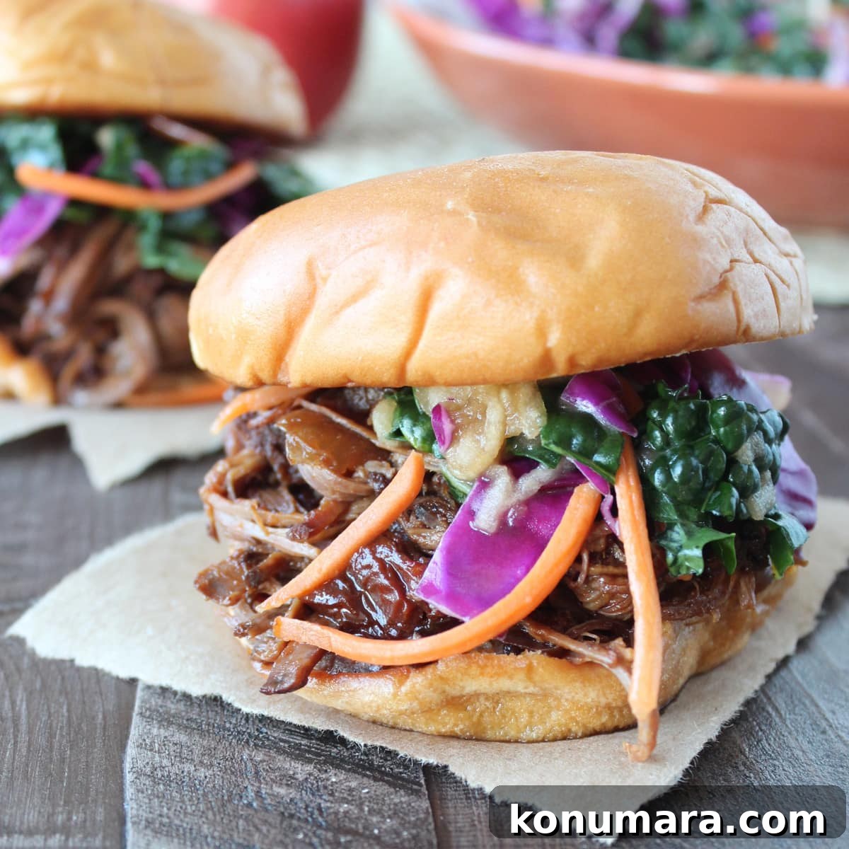 Slow-Cooked BBQ Brisket Sandwich with Smoky Sauce 10 shredded bbq brisket and coleslaw in between two hamburger buns
