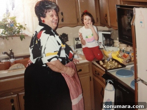 grandma and granddaughter in kitchen baking cookies