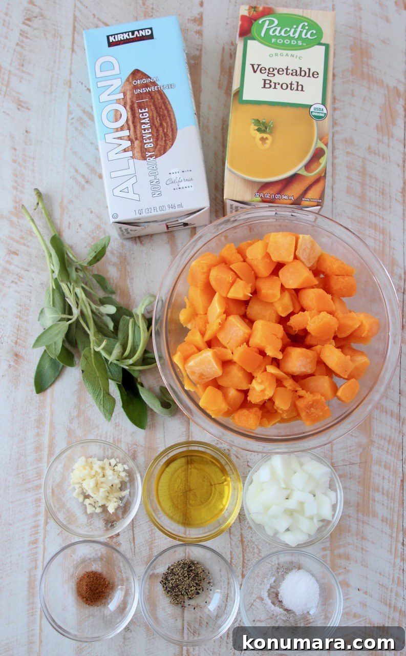butternut squash pasta sauce ingredients on a white wood board