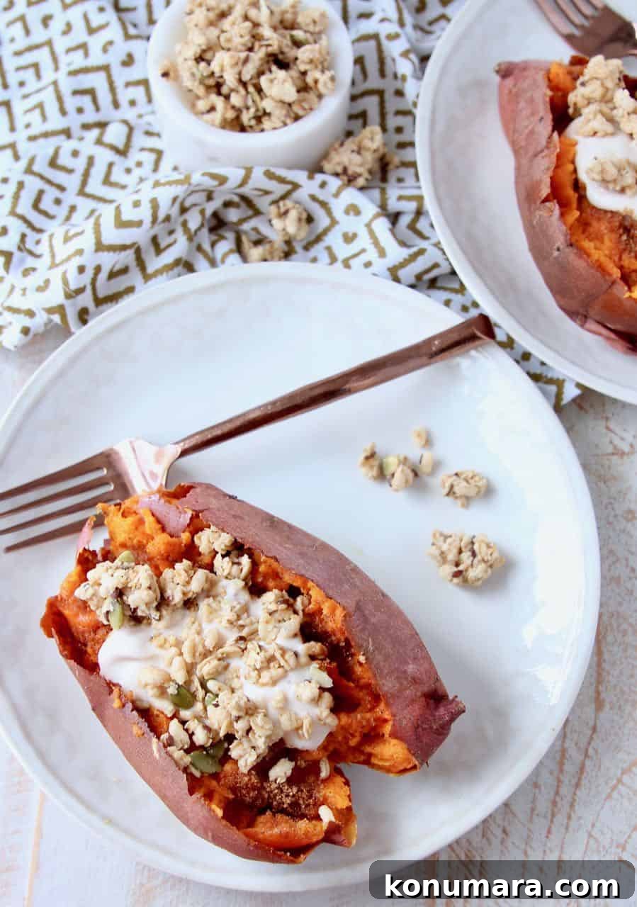 Overhead image of roasted sweet potato filled with yogurt and granola