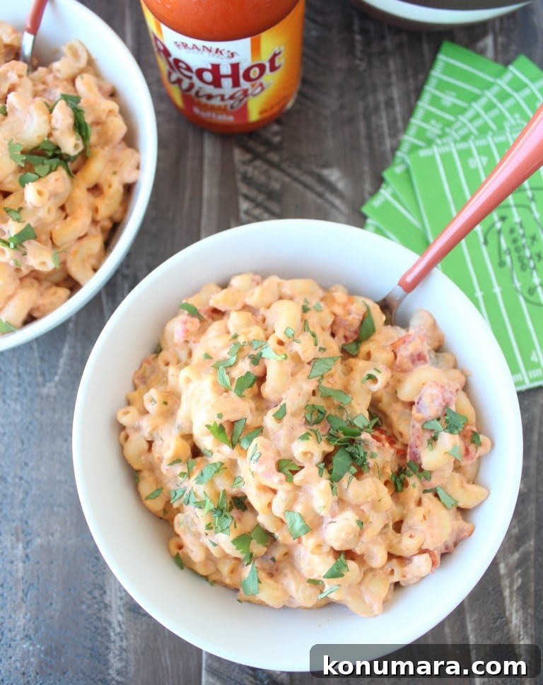buffalo sauce macaroni and cheese in bowl with fork
