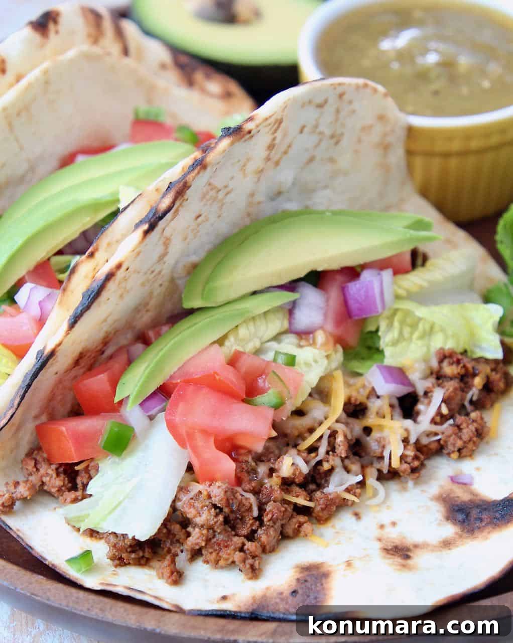 Trader Joe's Tacos: What to Buy, Reviews and Taco Recipes 2 Ground beef tacos with avocado and tomatoes