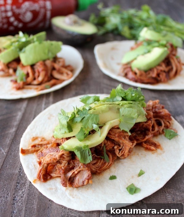 Slow Cooker Sriracha Honey Pulled Pork Tacos