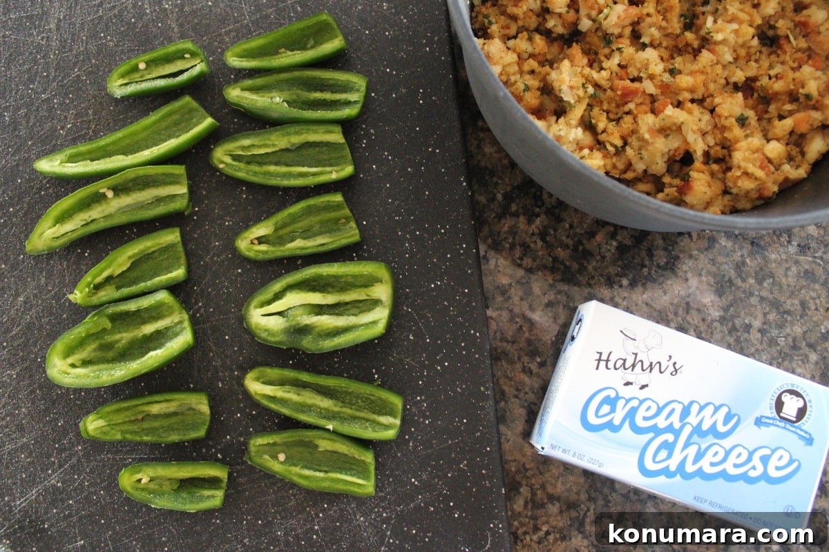 Preparing Cream Cheese Stuffing Jalapeno Poppers
